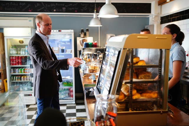 William buying Cornish pasties from local cafe on a visit to the Isles of Scilly