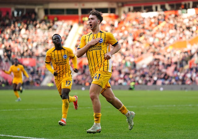 Jack Hinshelwood celebrates scoring a goal for Brighton