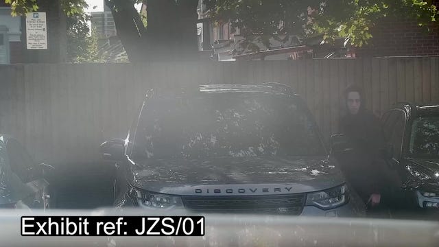 Alfie Coleman as he approaches a Land Rover in the car park outside a Morrisons supermarket