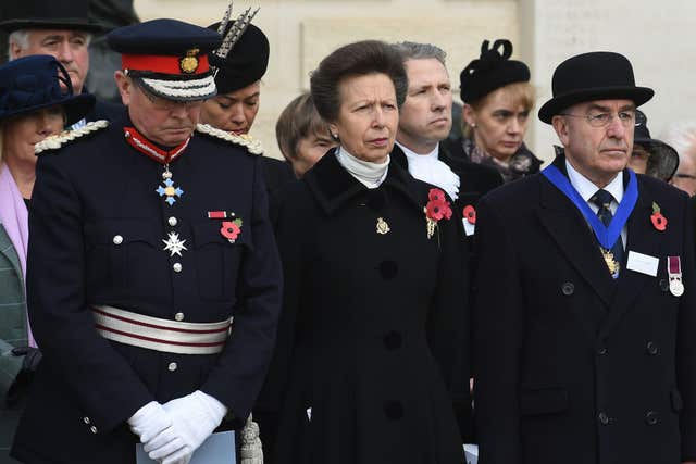 The Princess Royal observes a two minute silence alongside Lord Lieutenant of Staffordshire Ian Dudson (left) and National Vice Chairman of the Royal British Legion Terry Whittle (right) during a service at National Memorial Arboretum in Alrewas, Staffordshire to mark Armistice Day, the anniversary of the end of the First World War