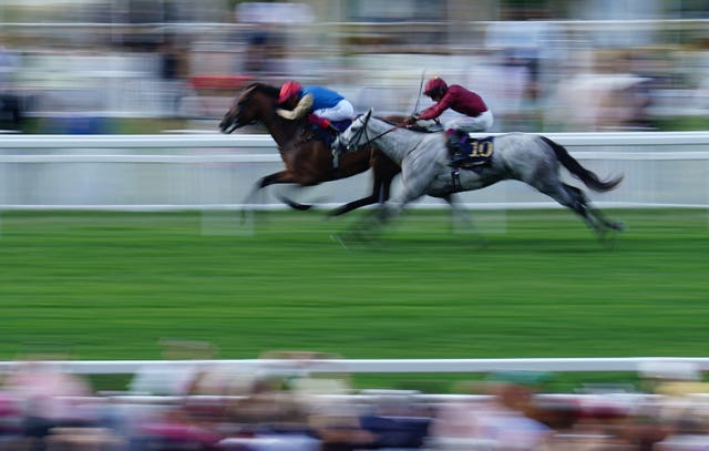 Gregory and Frankie Dettori (left) on the way to winning the Queen’s Vase