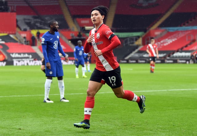 Liverpool are considering offering Takumi Minamino in exchange for Lucas Ocampos (Neil Hall/PA)
