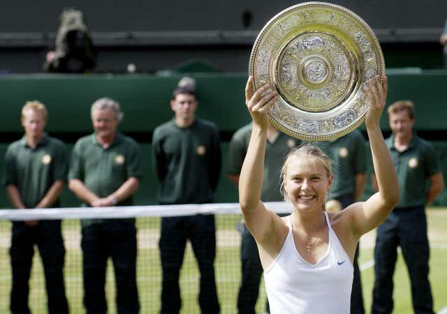 Maria Sharapova lifts the Wimbledon trophy