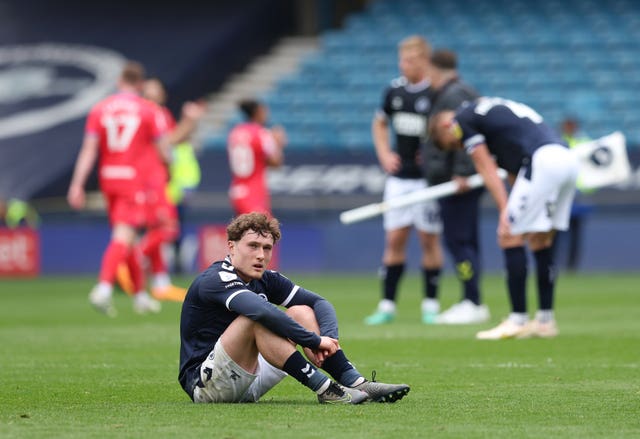 Millwall's Callum Styles sits dejected after the loss to Blackburn (Kieran Cleeves/PA)