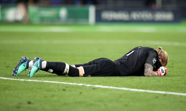 Loris Karius lies on the pitch after his errors led to Liverpool's defeat
