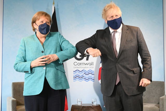 German Chancellor Angela Merkel with Prime Minister Boris Johnson ahead of talks at the summit