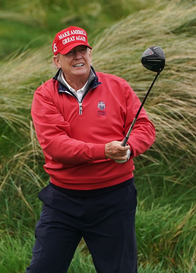 Donald Trump playing golf