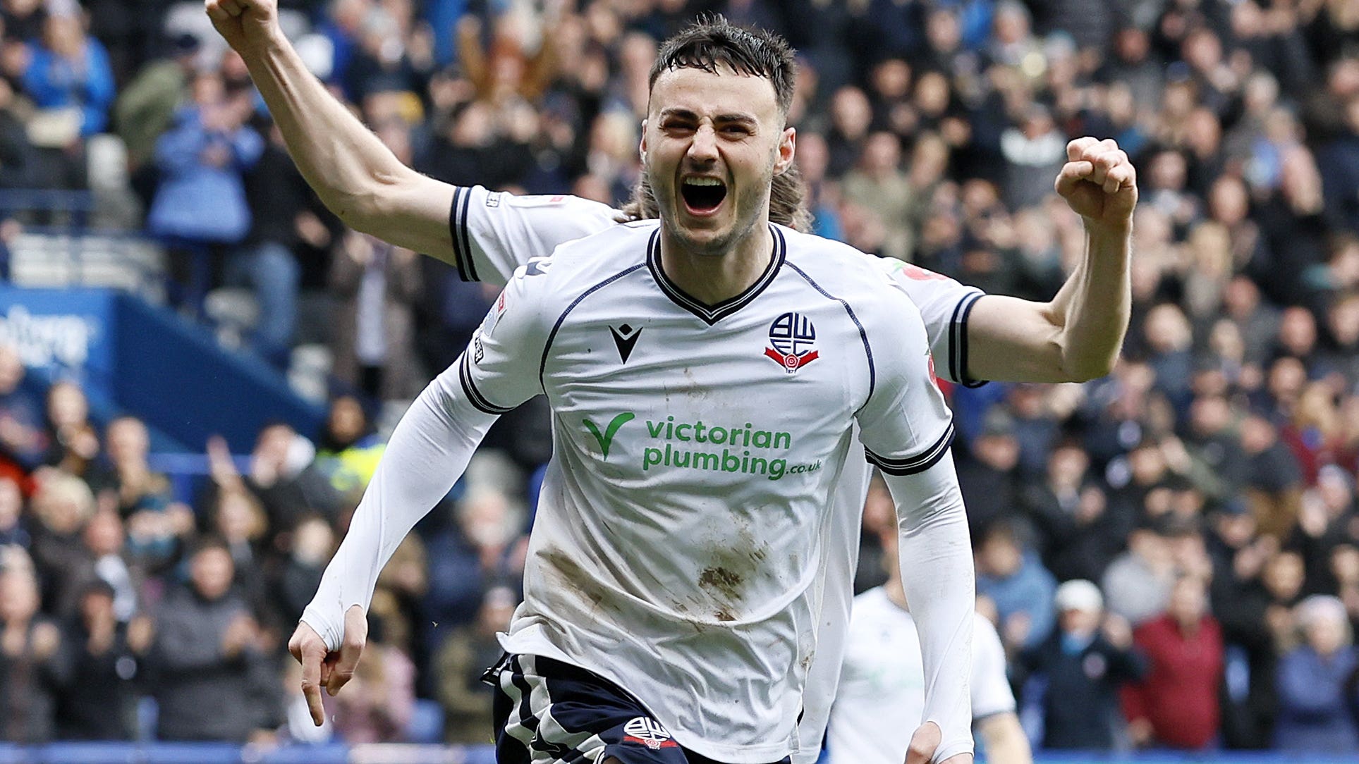 Aaron Collins levelled for Bolton at champions-elect Portsmouth (Ricahrd Sellers/PA)