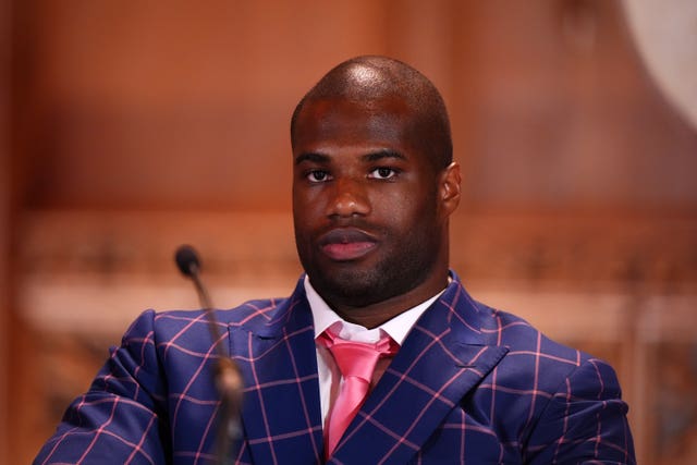 Daniel Dubois sits impassively during a press conference to preview his fight against Anthony Joshua