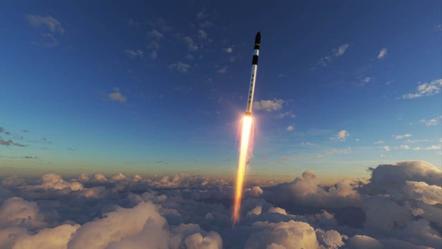 View of a rocket breaching through clouds