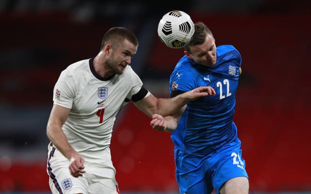 Eric Dier, left, challenges for a header with Iceland’s Jon Dadi Bodvarsson