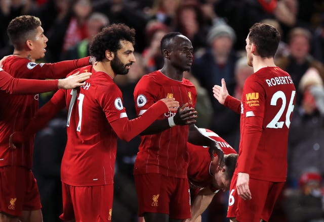The Reds made it a year unbeaten in the top flight by beating Sheffield United 2-0 at Anfield on January 2. Goals either side of half-time from Mohamed Salah, second left, and Sadio Mane, second right, did the damage against the Blades