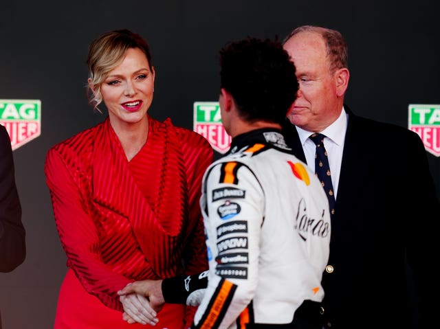 Princess Charlene of Monaco congratulates Lando Norris