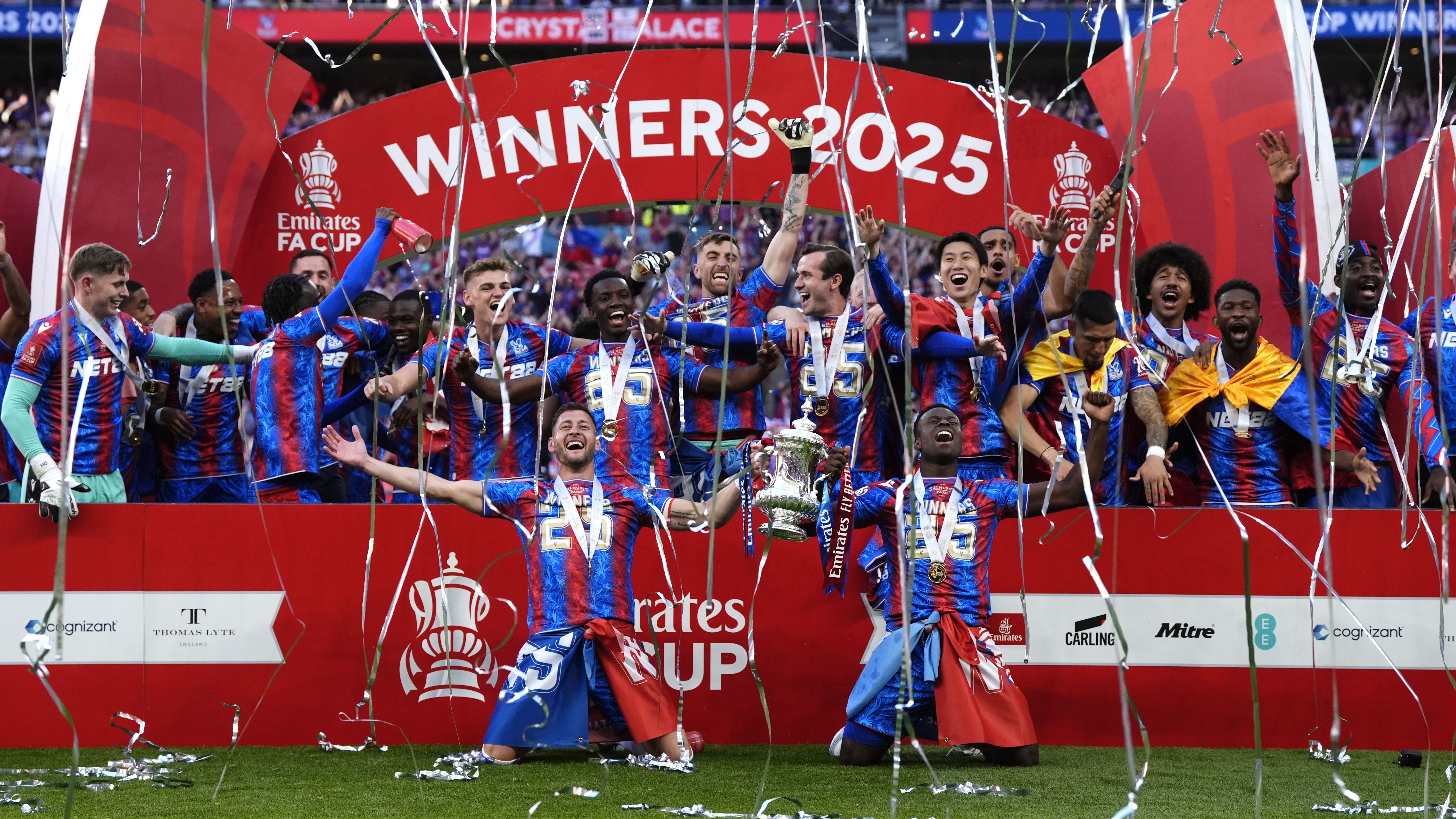 Crystal Palace players celebrate with the trophy (Nick Potts/PA)