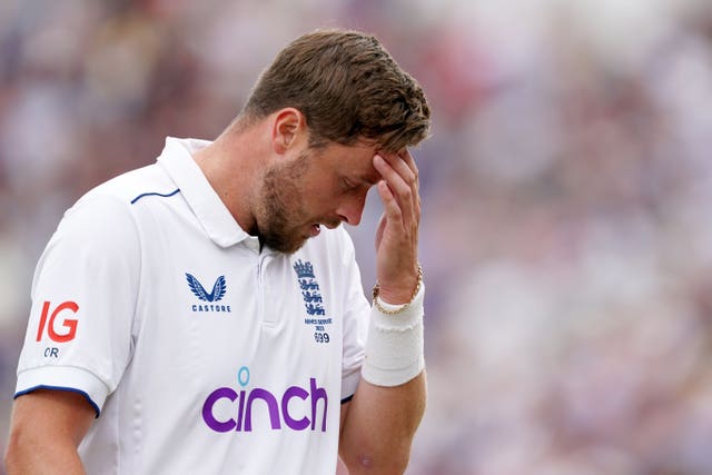 Ollie Robinson left the field two balls into his 12th over because of injury (Mike Egerton/PA)