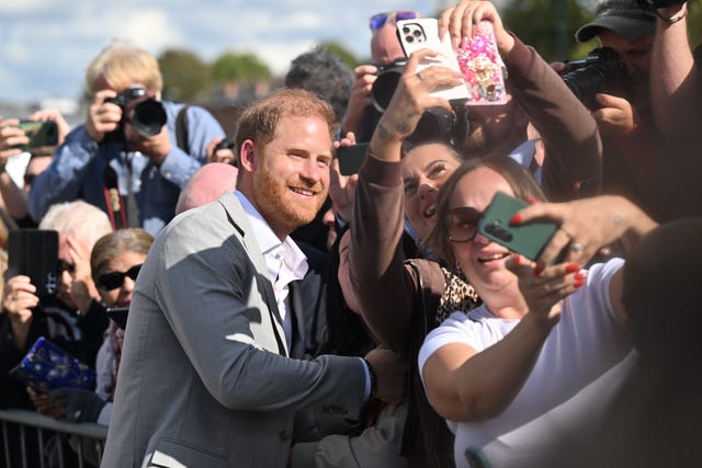 Harry greets members of the public following a visit to the Community Recording Studio (CRS) in Nottingham in September
