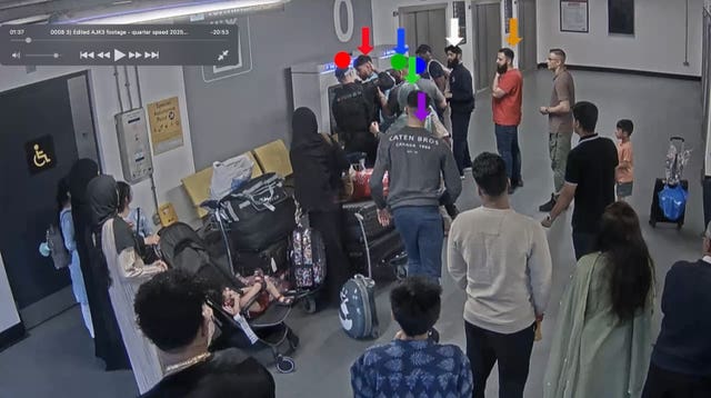 CCTV still showing Pc Lydia Ward (green dot) and Mohammed Fahir Amaaz (red arrow), Pc Ellie Cook (blue dot), Pc Zachary Marsden (red dot) and Muhammad Amaad (blue arrow), during the alleged assault of three police officers which has been shown to jurors at Liverpool Crown Court