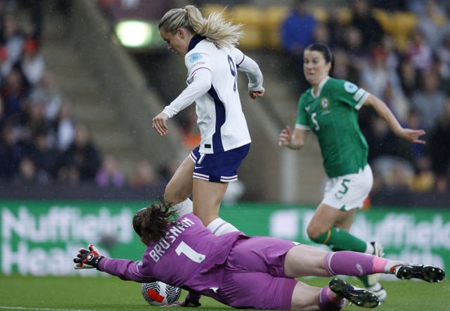 Alessia Russo, centre, goes round diving goalkeeper Courtney Brosnan to put England ahead against the Republic of Ireland