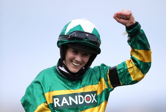 Rachael Blackmore celebrates on Minella Times after winning the 2021 Randox Grand National