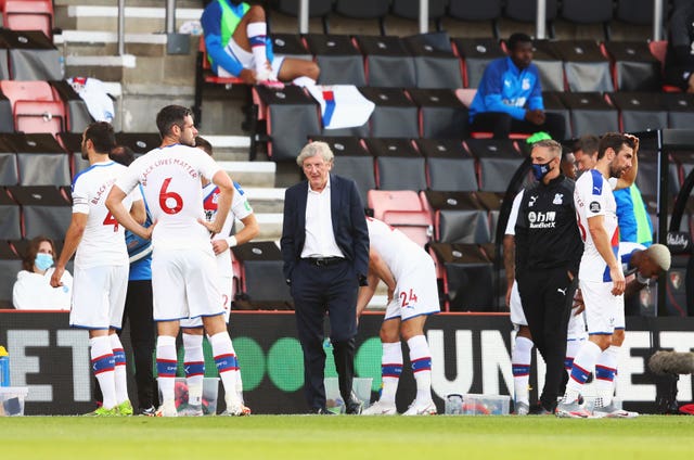 Crystal Palace manager Roy Hodgson talks to his team during their return to the Premier League