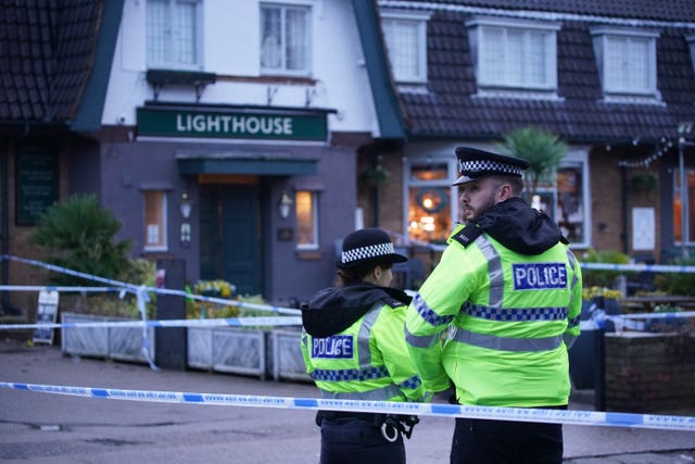 Police outside the Lighthouse Inn after the shooting