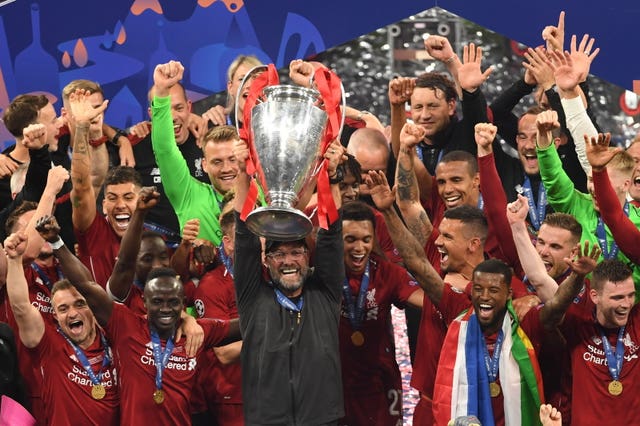 Liverpool manager Jurgen Klopp lifts the Champions League trophy following victory over Tottenham at the Wanda Metropolitano in Madrid