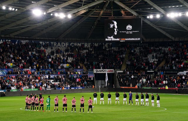 Swansea and Sheffield United players, officials and fans remember the Queen ahead of their Championship match at the Swansea.com Stadium 