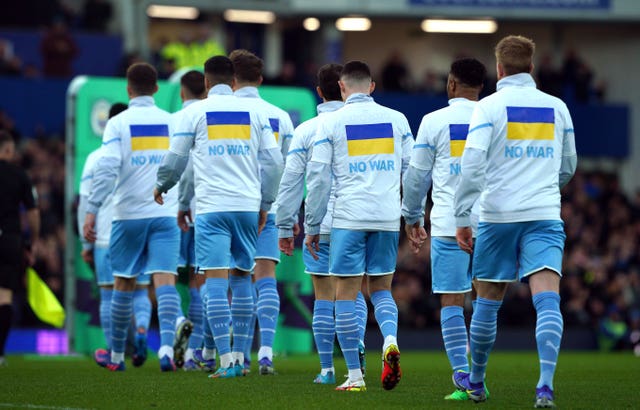 Manchester City players show their support for Ukraine ahead of their clash against Everton 