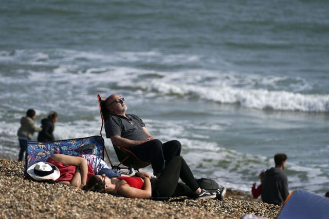 People enjoyed the summery weather in Southsea, Hampshire on the last weekend of March (Steve Parsons/PA)
