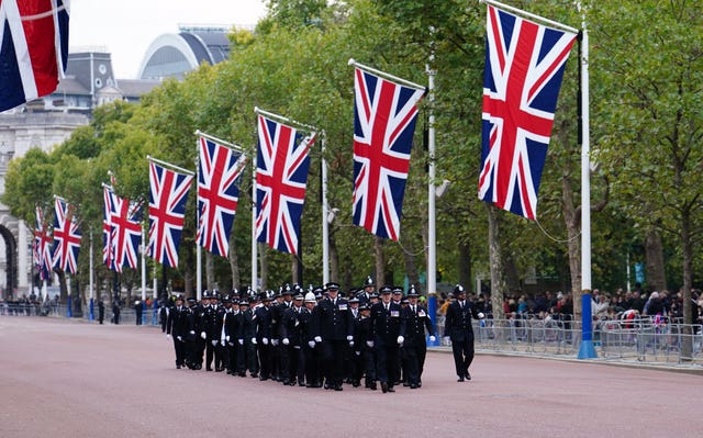 Police officers walk down The Mall, central London ahead of the Queen's funeral