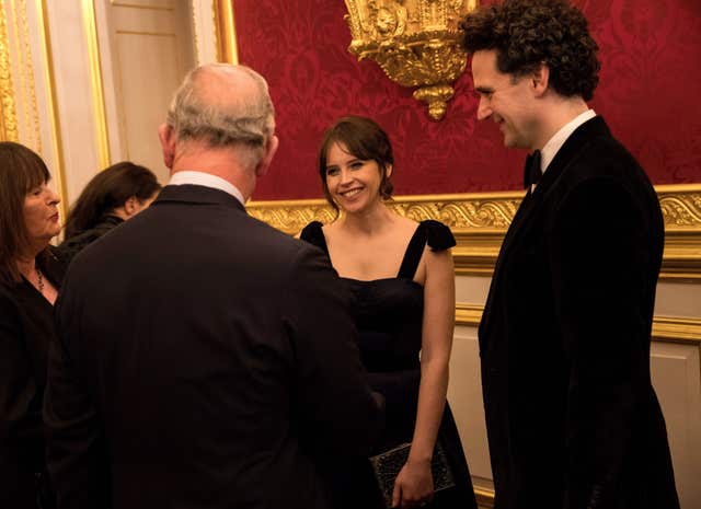 Charles meets actress Felicity Jones (John Phillips/PA)