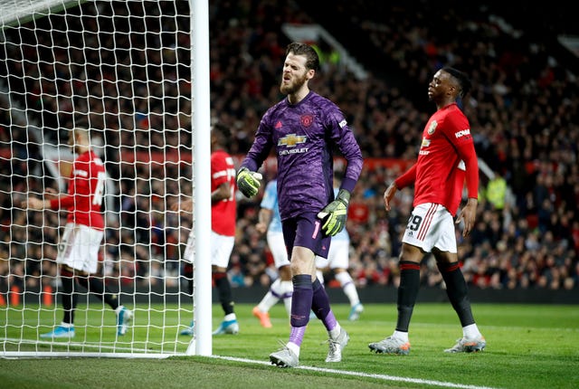 David De Gea reacts after Andreas Pereira''s own goal