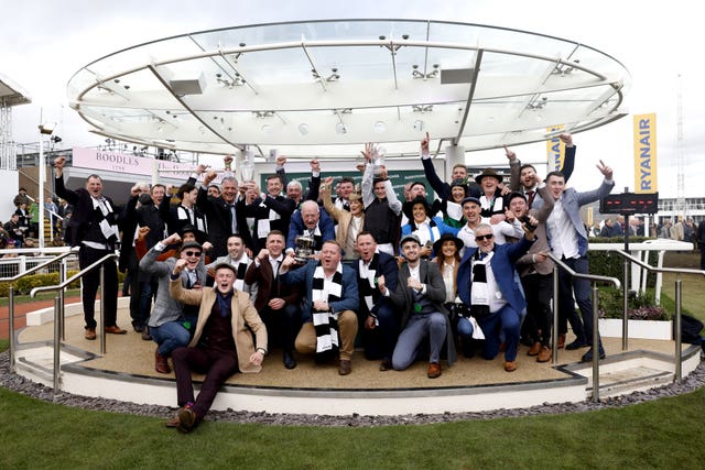 Winning connections celebrating Flooring Porter's success in the World Hurdle last year 