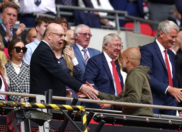 Avram Glazer, left, pictured alongside former Manchester United manager Sir Alex Ferguson at last Saturday's FA Cup final 