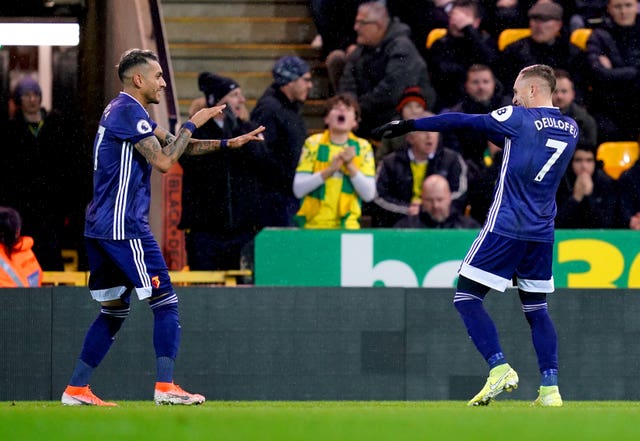 Watford’s Gerard Deulofeu (right) celebrates scoring at Carrow Road