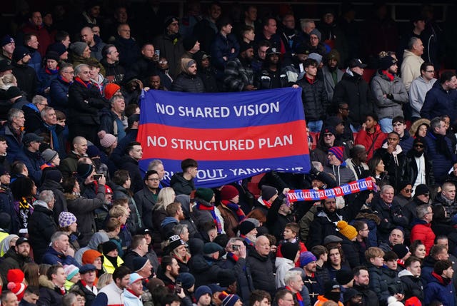 Crystal Palace fans unveil a banner in the stands 