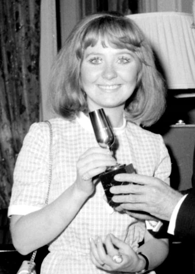 British singer Lulu with her trophy after coming joint first in the Eurovision Song Contest with her song, Boom Bang-A-Bang (PA)