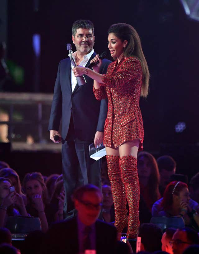 Nicole Scherzinger and Simon Cowell