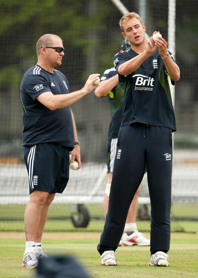 Saker shares some tips with Stuart Broad (right) during his first stint with England.