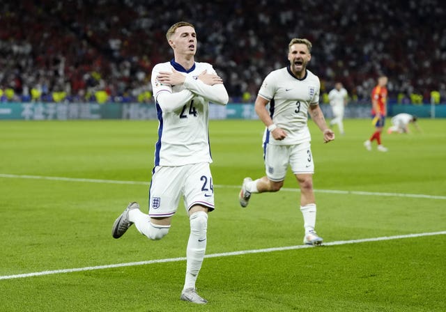 Cole Palmer celebrates for England
