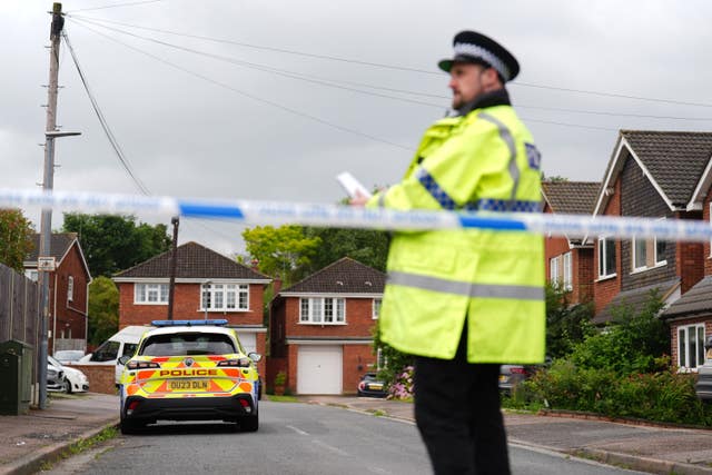 Police at the scene in Ashlyn Close, Bushey, Hertfordshire