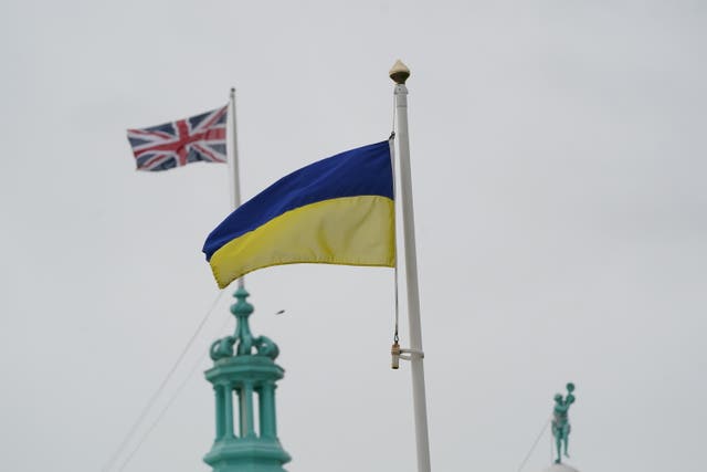 An Ukrainian and Union flag flying above Spanish City in Whitley Bay, North Tyneside