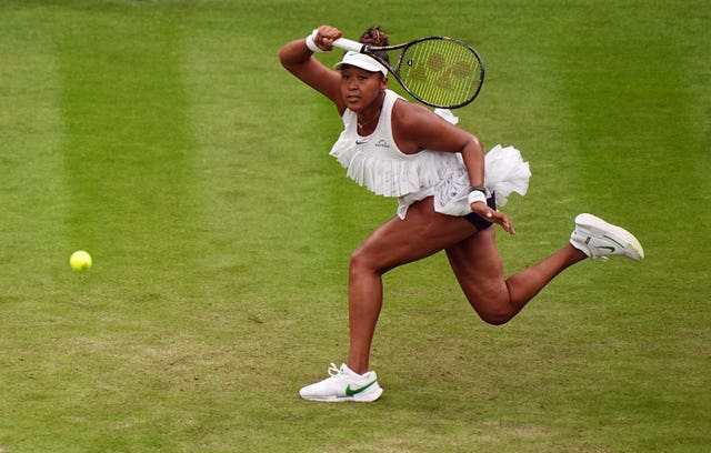 Naomi Osaka hits a forehand at Wimbledon