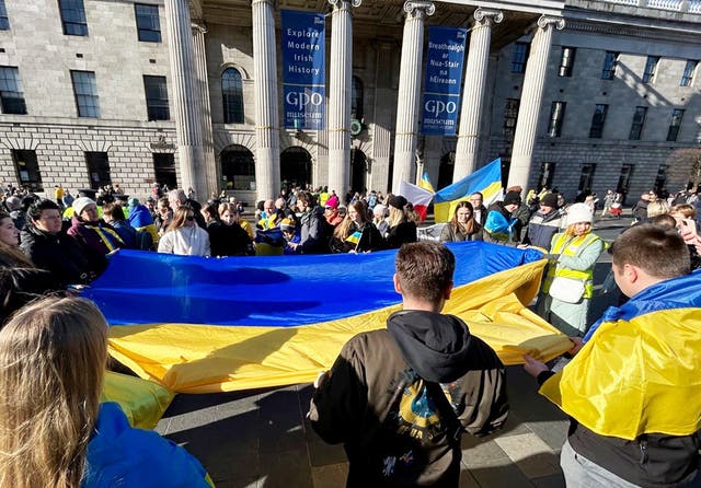 People gather outside the GPO building in O’Connell Street, Dublin, to take part in a demonstration to mark the two year anniversary of the Russian invasion of Ukraine. 