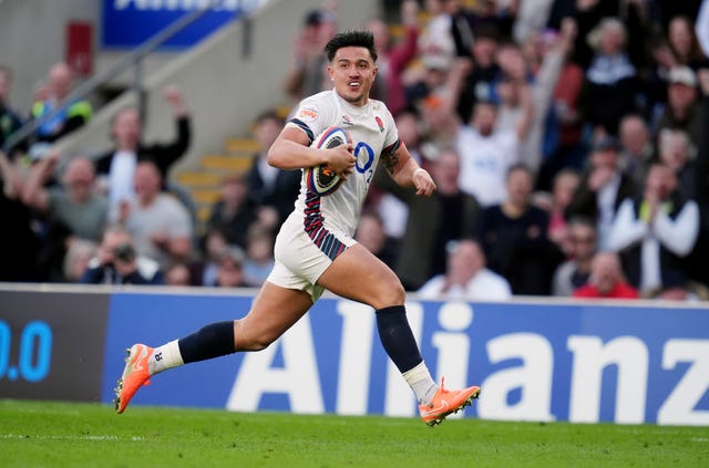 England’s Marcus Smith runs in to score against Italy