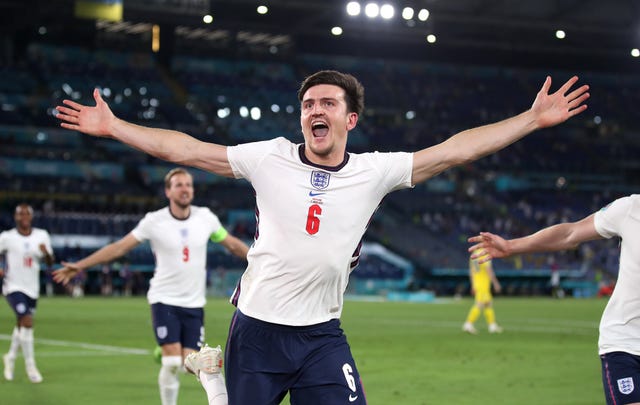 Harry Maguire celebrates after scoring England's second goal