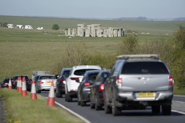 Cars make their way along the A303 past Stonehenge 