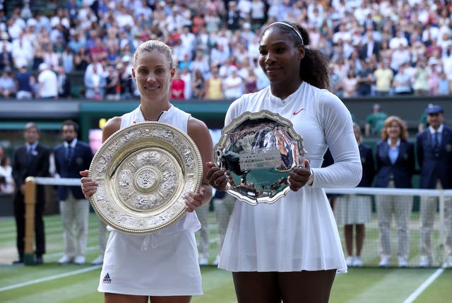 Angelique Kerber holds the Venus Rosewater Dish, and unusually Serena Williams settles for second prize