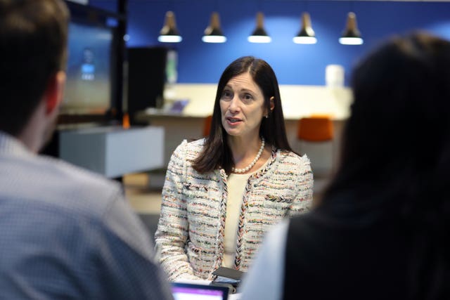 Cindy Rose sitting in front of an audience