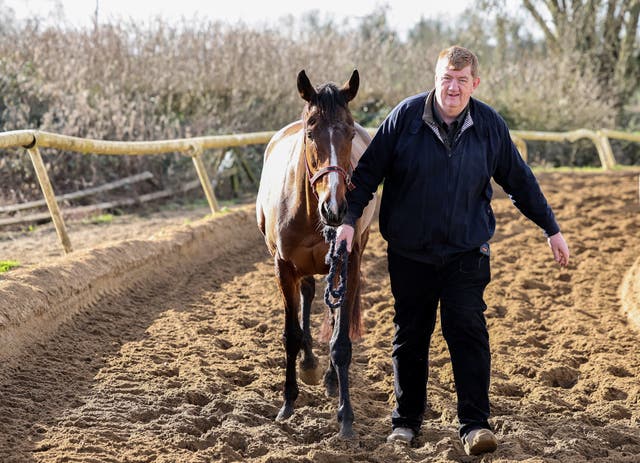 John ‘Shark’ Hanlon with Hewick on his gallops 